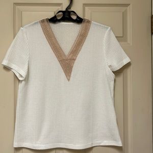 White V-neck top